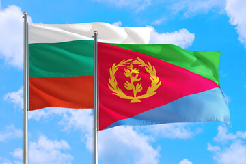 Fototapeta premium Eritrea and Bulgaria national flag waving in the windy deep blue sky. Diplomacy and international relations concept.