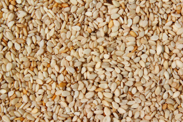 Heap of organic natural sesame seeds