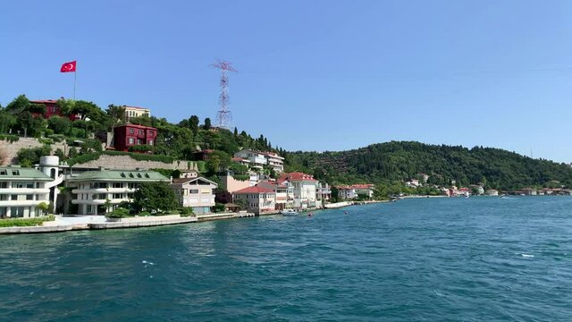 Footage of Anadolu hisari / Kandilli area of Istanbul by Bosphorus. Beautiful scene. It is a sunny summer day. Camera moves forward.