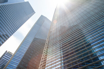 Fototapeta na wymiar city skyscrapers. Looking Up At Modern Corporate Buildings Abstract Crop Background - stock photo