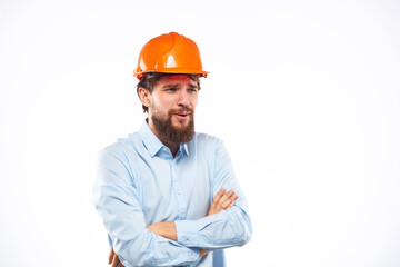 man in work uniform orange helmet professional safety industry construction