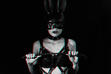 portrait of sexy girl in harness masked Bunny with leather Flogger - obrazy, fototapety, plakaty