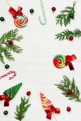 Fototapeta na wymiar Colorful Christmas swirl candy, traditional New Year candy canes, xmas sweet food and New Year small balls