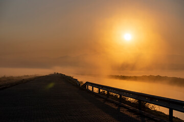 Obraz premium Sunrise with the mist over the river and the plain in Kayseri, in front of Erciyes mountain