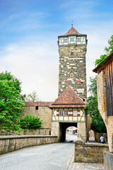 Old castle gate with castle tower in Rothenburg ob der Tauber, Bavaria, Germany