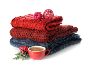 Stylish winter clothes on white background