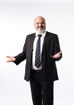 Closeup Portrait Of A Confident Indian Asian Mature Businessman Against White Background