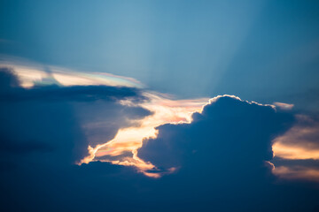 Beautiful iridescent cloud, Irisation or rainbow cloud on sky