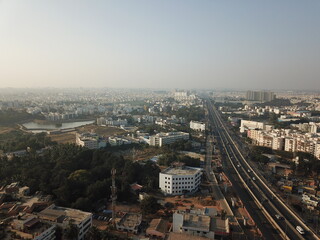 Fototapeta premium Aerial lake view of the buildings in the center of Bangalore city 