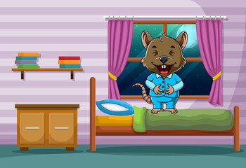 Happy mouse using the pajamas and standing in his bed