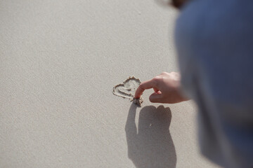 Hand drawn heart on the sand And an empty space for text input