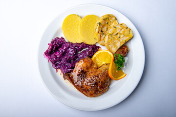 Roast christmas goose, duck with dumplings and cabbage