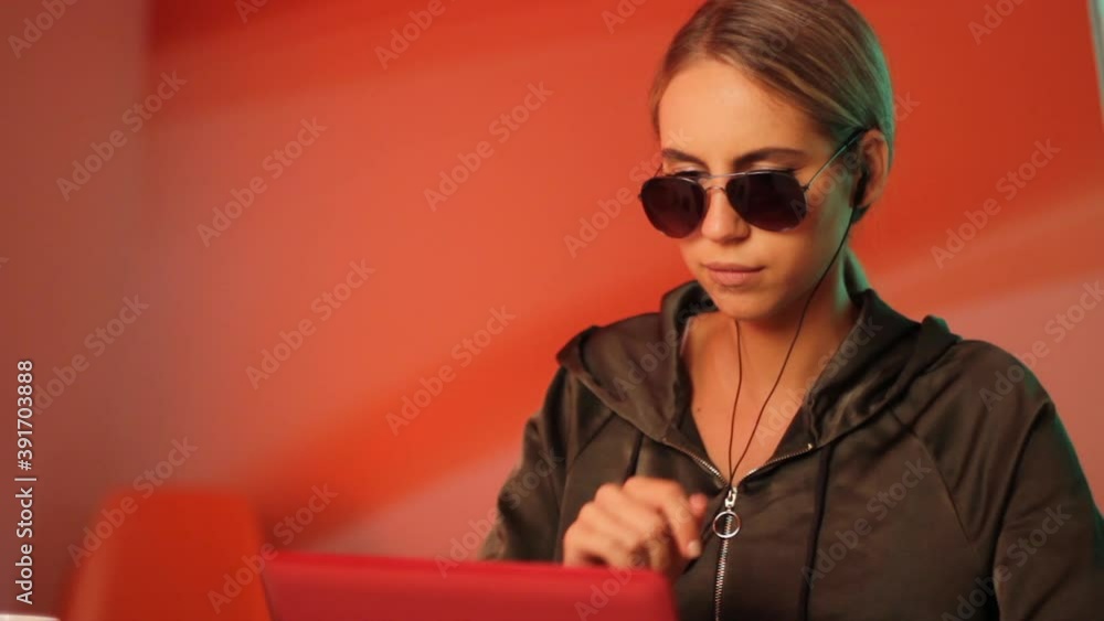 Aufkleber hacker girl working on laptop computer, close up static full frame