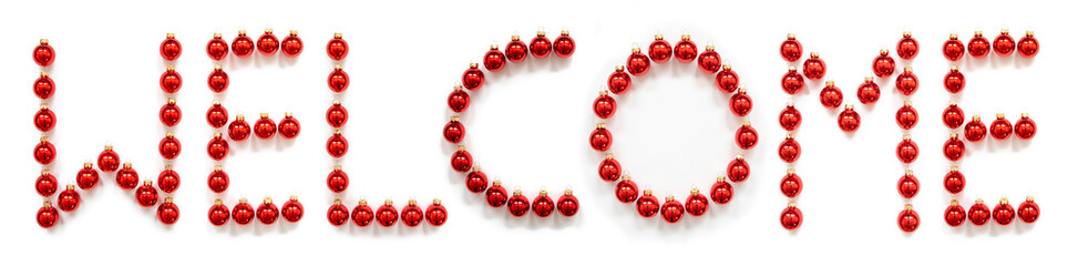 Red Christmas Ball Ornament Building English Word Welcome. Festive Christmas Decoration. White Isolated Background