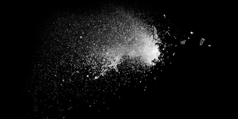 Small pieces of broken glass isolated on black background