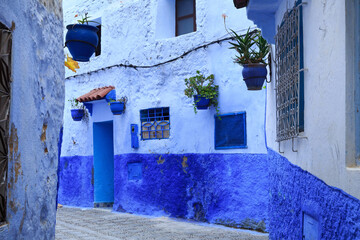 View of the blue walls of Medina quarter in Chefchaouen, Morocco. The city, also known as Chaouen...