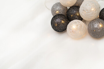 glowing christmas garland. Balls of threads.