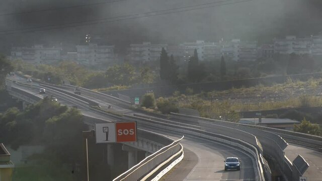 stretch of the Messina Catania motorway in Sicily along the coast at sunset near Taormina