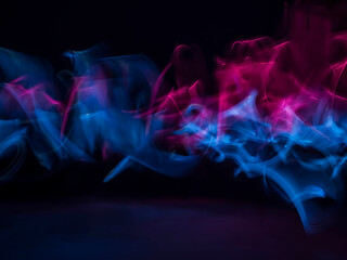 abstract background with lights. Blue and White Light Trails Created in Camera. stock photo
