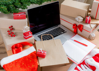Laptop gifts package box shopping bag red hat new year delivery christmas