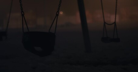 Empty swing children's playground child death dark concept night fog