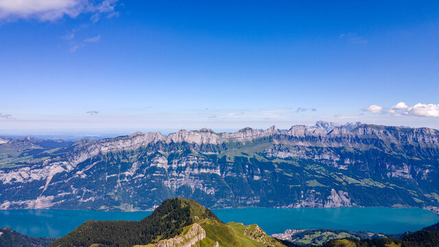 Beautiful mountain chain Panoroma in Flums Switzerland on a sunny day with Leistchamm and Brisi - Drone Perspective Landscape Photography