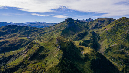 Obraz na płótnie Canvas Sächsmoor and a beautiful mountain panorama on a sunny day - Drone Perspective Landscape Photography