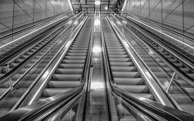 Empty Public Escalator of a metro staion in Black and White, The Netherlands