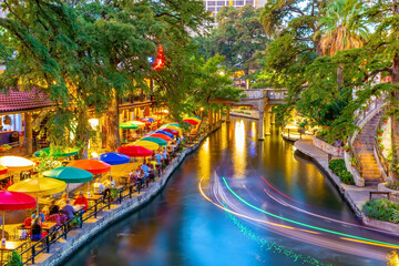 Fototapeta na wymiar River walk in San Antonio city downtown skyline cityscape of Texas USA