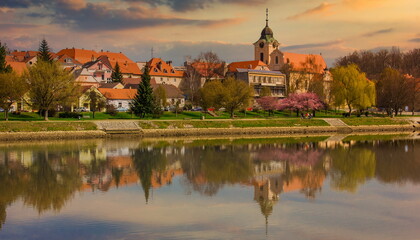 Sunset over the town of Tyn nad Vltavou, Czechia. Springtime evening in Czechia.