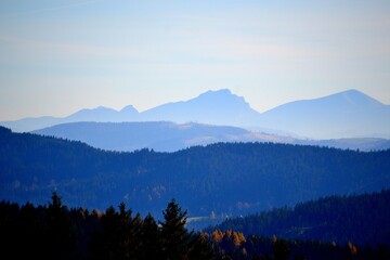 photo of the ridges of the Beskydy mountains and distant peaks of the Orava mountains in the autumn mist