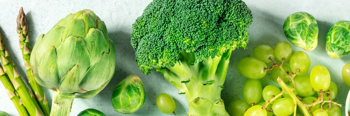 Green food panorama with healthy fresh antioxidants, top shot, spring or summer menu concept