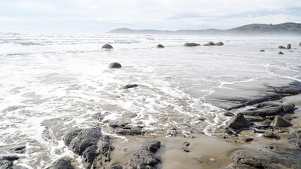 Spherical Rock Moeraki Boulders located at Koekohe Beach on the South Island of New Zealand.