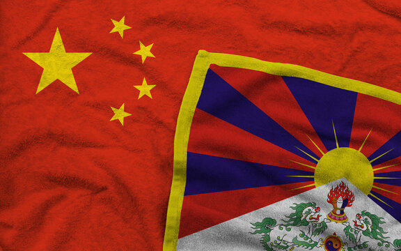 China and Tibet flags pattern on towel fabric are placed together.