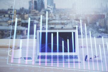 Financial market graph hologram and personal computer on background. Multi exposure. Concept of forex.