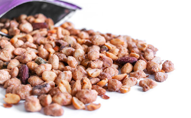 closed up of mixed assortment roasted peanut, cashew, pecan hazelnut a snack fruits, isolated on white background for texting.