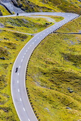 Motorcycle rider in the Alps