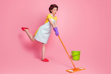 Full length photo of wife girl wash floor mop wear dotted skirt dress rubber gloves isolated on...