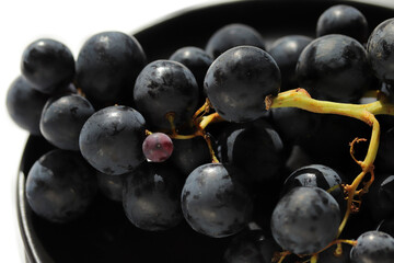 Fresh dark red grapes close up