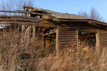 wooden collapsing barn in the village