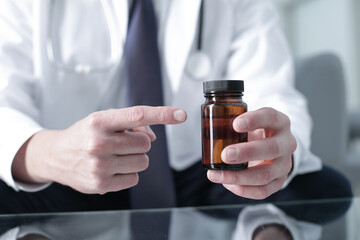 Doctor working in the clinic consults the patient