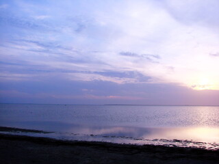 Boundless natural color palette of sunset over Lake Sivash.