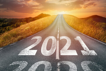 2021 write on road pointed to golden sunset on high mountain metaphor plan and success or vision...