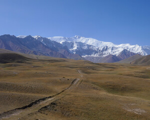 View of Lenin Peak nowadays Ibn Sina peak in the snow-capped Trans-Alay or Trans-Alai mountain range in southern Kyrgyzstan