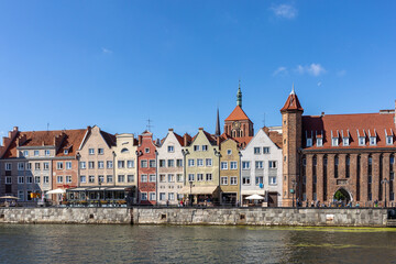 Naklejka na ściany i meble Gdansk, Old Town - historic tenement houses with gables on the banks of the River Motlawa, Poland