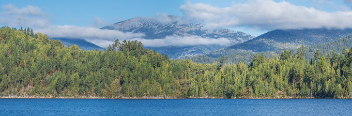 Fototapeta premium Panoramic view, sunny day. Sayano-Shushensky reservoir on the Yenisei River in Siberia.