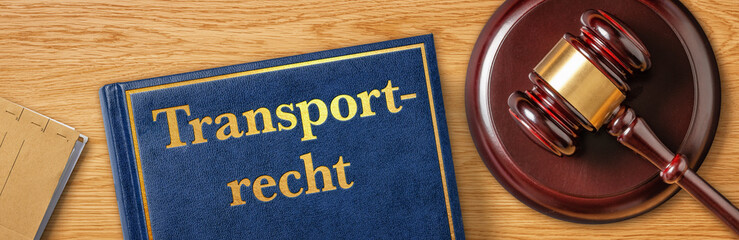 Richterhammer mit Gesetzbuch - Transportrecht