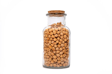 A Jar of dried Chickpeas isolated on a white background, nutritious legumes dried and stored. Healthy food choice.