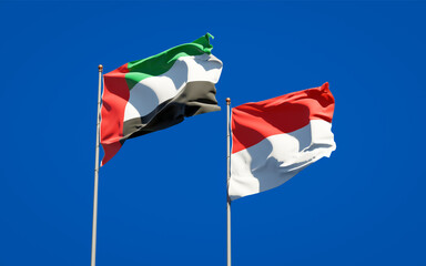 Beautiful national state flags of United Arab Emirates UAE and Indonesia.