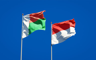 Beautiful national state flags of Madagascar and Indonesia.